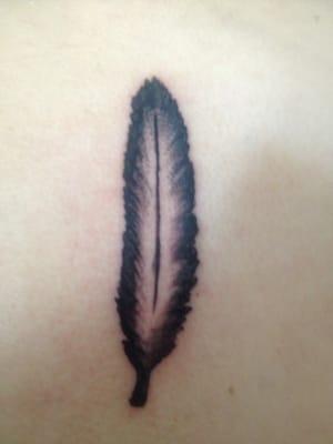 Feather tattoo done by Alex