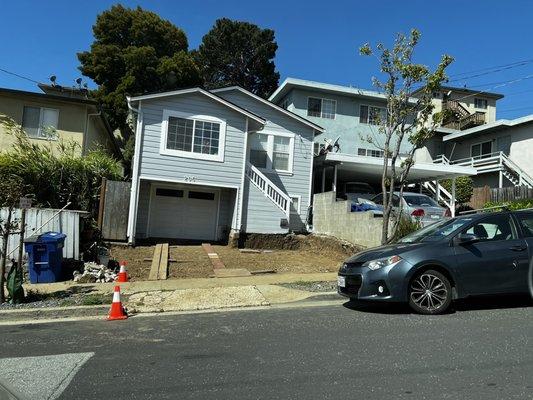 Frontage and garage he dug and did not finish