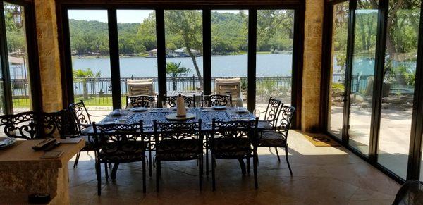 Sliding glass doors open fully to make open air cabaña.