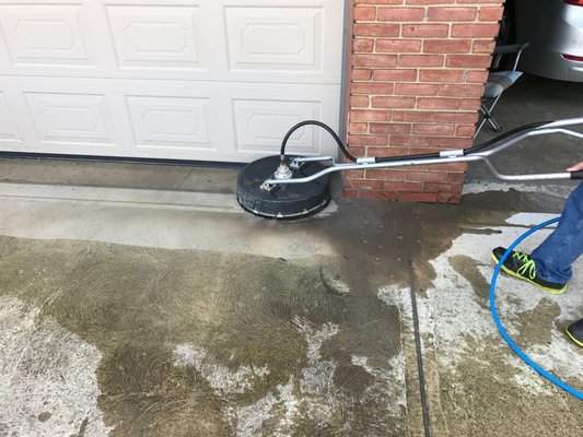 Pressure washing at a home in Zanesville Ohio with high pressure using a surface cleaner.