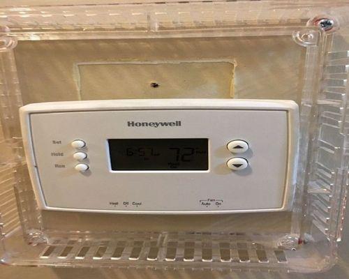 Heating and Air Conditioning: Thermostat repair