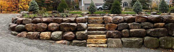 Boulder wall with custom staircase.