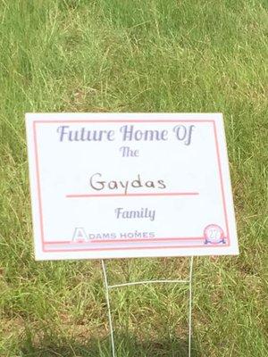 Sign on the new house lot.