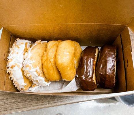 Coconut, glazed, and chocolate iced donuts