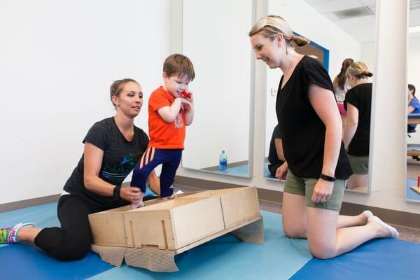 Erin and Jett working with CME boxes.