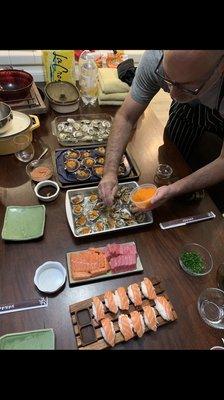 Scallops, fatty salmon and blue fin. Delicious oysters with masago.