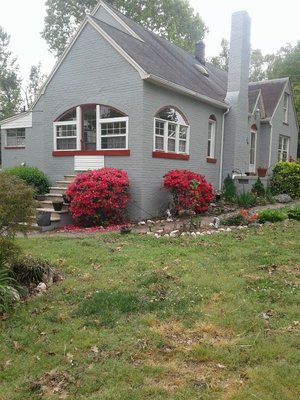 We powerwashed and painted plus we trimmed in all windows and designed the sill too match the landscape.We installed the roof 15 yrs ago.