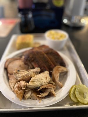 Insanely Good ($17.99) ribs with pulled chicken, smoked turkey, and cheesy corn.