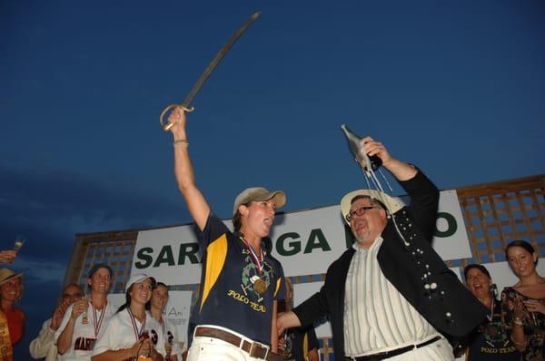 Opening champagne with a sword