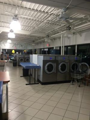 Lots of large washing machines and dryers!