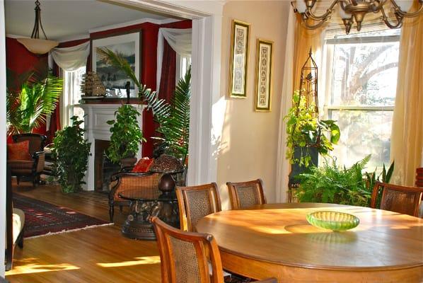 The sunny breakfast room and adjoined living room.