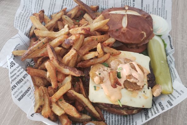 Fire Alarm burger w/fries ($12.50): fried jalapenos, pepperjack cheese, spicy mayo, pretzel bun