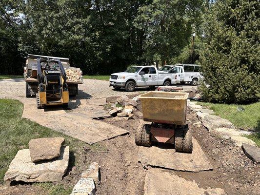 We installed a large Dry Creek to divert water to storm drains