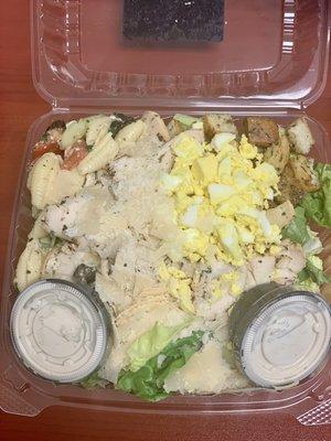 Chicken Caesar salad with added chopped egg