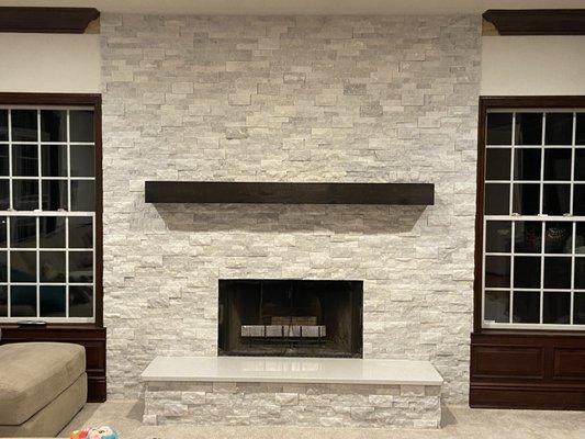 New mantle and stone fire place wall