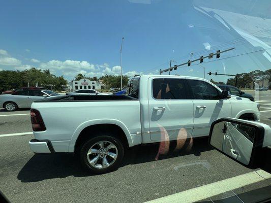 The truck I drove hundreds of miles to buy... following me to the gas station to put fuel in my truck that was supposed to be my trade-in.