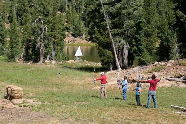 Families do Archery at Family Camp