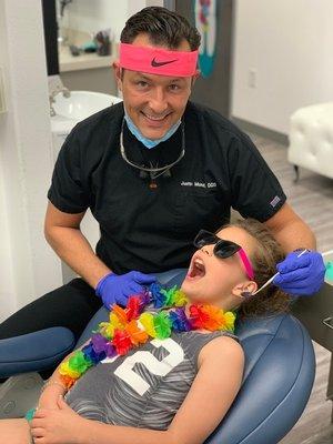 Dr. Mund, the Smile Ninja with a patient.