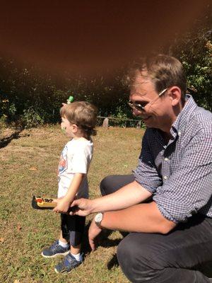 Byron showing a little cutie pie how the truck works. It made good whole day!