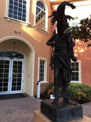 Witch doctor statue at front entrance