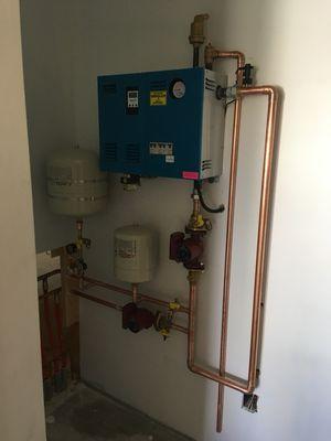 Residential electric boiler install.