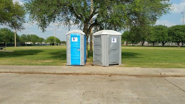 Portable toilets in the parking lot