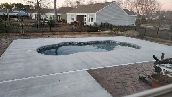 pool finished by P&P with concrete installation.  We are just awaiting our landscaper.