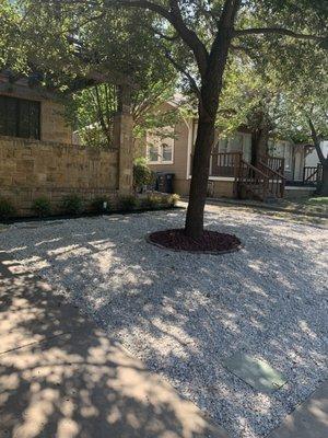 After Lawn Escapades...xeriscape with crushed limestone and new plants.