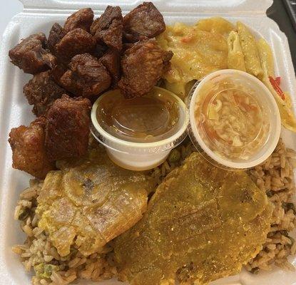 Gryio (Fried Pork) Rice and Beans Plantain and Mac N Cheese