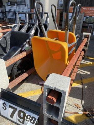 For $79.98, a Home Depot worker will gladly scrape your bumper loading this wheelbarrow into your car