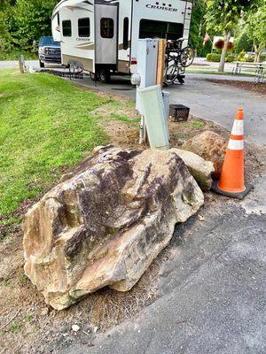 The rocks and utilities we had to make it around to get into the pull-thru.