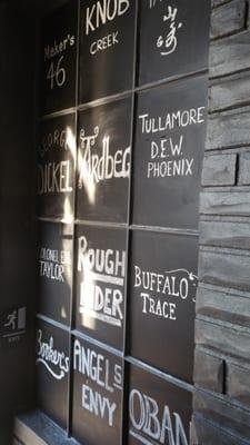 Inside chalk board wall of whiskey