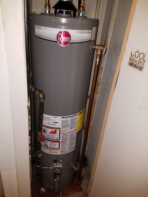 Removed old GE water heater install new 29 gallon Rheem