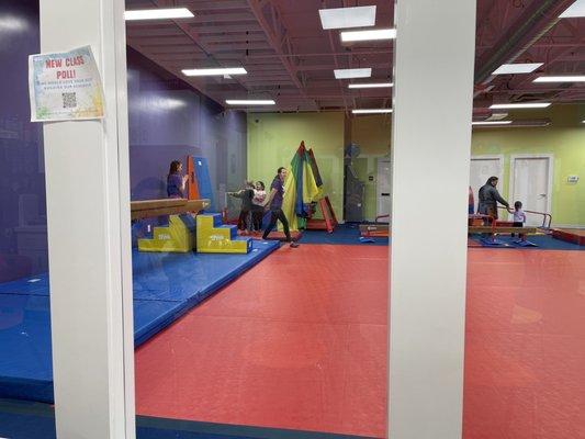 View from inside the party room looking into the gym area.