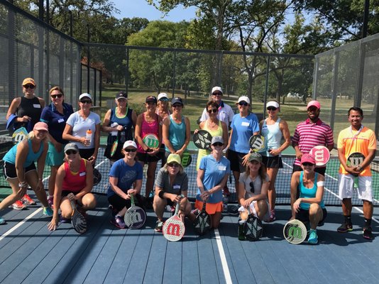 Platform tennis players enjoying a great day outside