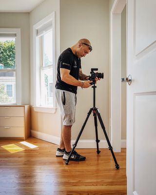 BTS shot of Luxe Life owner, Matt, shooting a luxury condo in Boston, Ma! Photo by Luxe Life Productions!