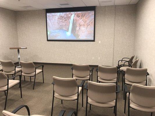 Training Room 100" diagonal screen with a Hitachi Commercial projector and sound system.