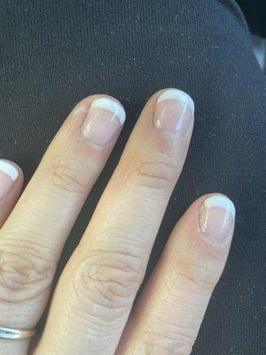 Tech Smeared shellac all over my finger..burned my fingers she applied shellac to skin and did not clean off..  light.