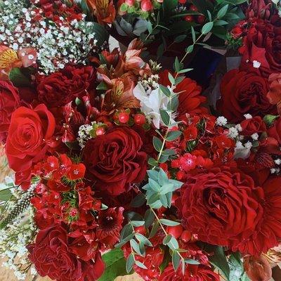 Red themed grab-and-go's (bouquets already put together by our florist)