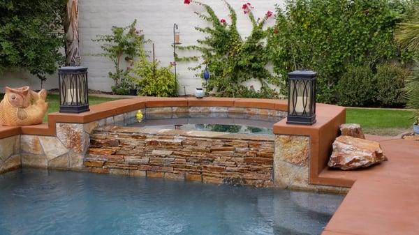 spa with stackstone spillway in Rancho Mirage by American Heritage Pool Corporation