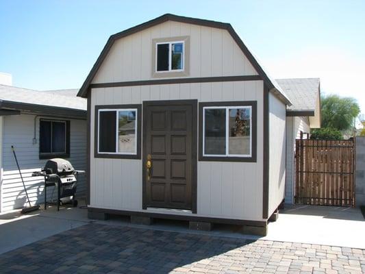 Barn Style or Gambrel Style Shed. Optional upgraded door and windows. Includes Loft for Additional Storage.