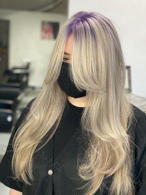 A bold shadow root and all over blonde