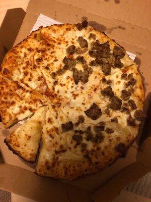 Sloppiest pizza I have ever seen! Half cut and portions not even. Never ordering from this location again!