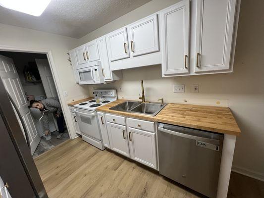 Kitchen is painted already and butcher countertop was added