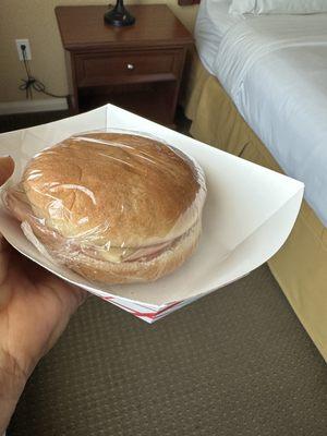 This is the famous ham sandwich . Very disappointing.  Two thin slices of ham , one slice of cheese and a hamburger bun .