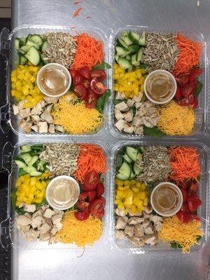 Fresh, delicious, whole foods like our Super Green salad, with rainbow color veggies and plenty of protein and healthy fats.