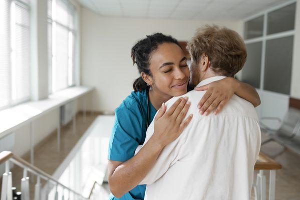 Phlebotomist greeting patient