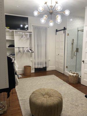 Photos of our "multi-purpose bath, laundry, exercise and walk in closet... with a TV up there too!