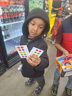 This is the kids holding their little cards and toys trying to check out at the Dollar General. We had to leave everything behind.