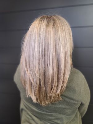 All over color, full highlight, haircut + blow-dry style.